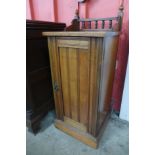 A Victorian Aesthetic Movement walnut pot cupboard