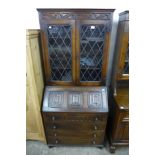 An oak bureau bookcase