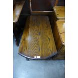 An Old Charm oak drop-leaf coffee table