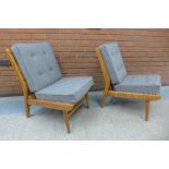 A pair of Scandart teak and Harris Tweed lounge chairs