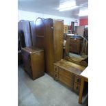 An Art Deco oak three piece bedroom suite