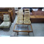 A set of four bamboo chairs and a coffee table