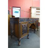 A late 19th/early 20th Century Anglo-Indian carved rosewood breakfront sideboard