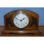 An early 20th Century walnut timepiece