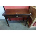 A Victorian mahogany rectangular fold over tea table