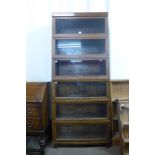 A Globe Wernicke oak six tier sectional stacking bookcase