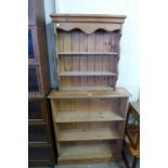 A pine open bookcase and a Delft rack