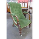 A Victorian mahogany and upholstered open armchair