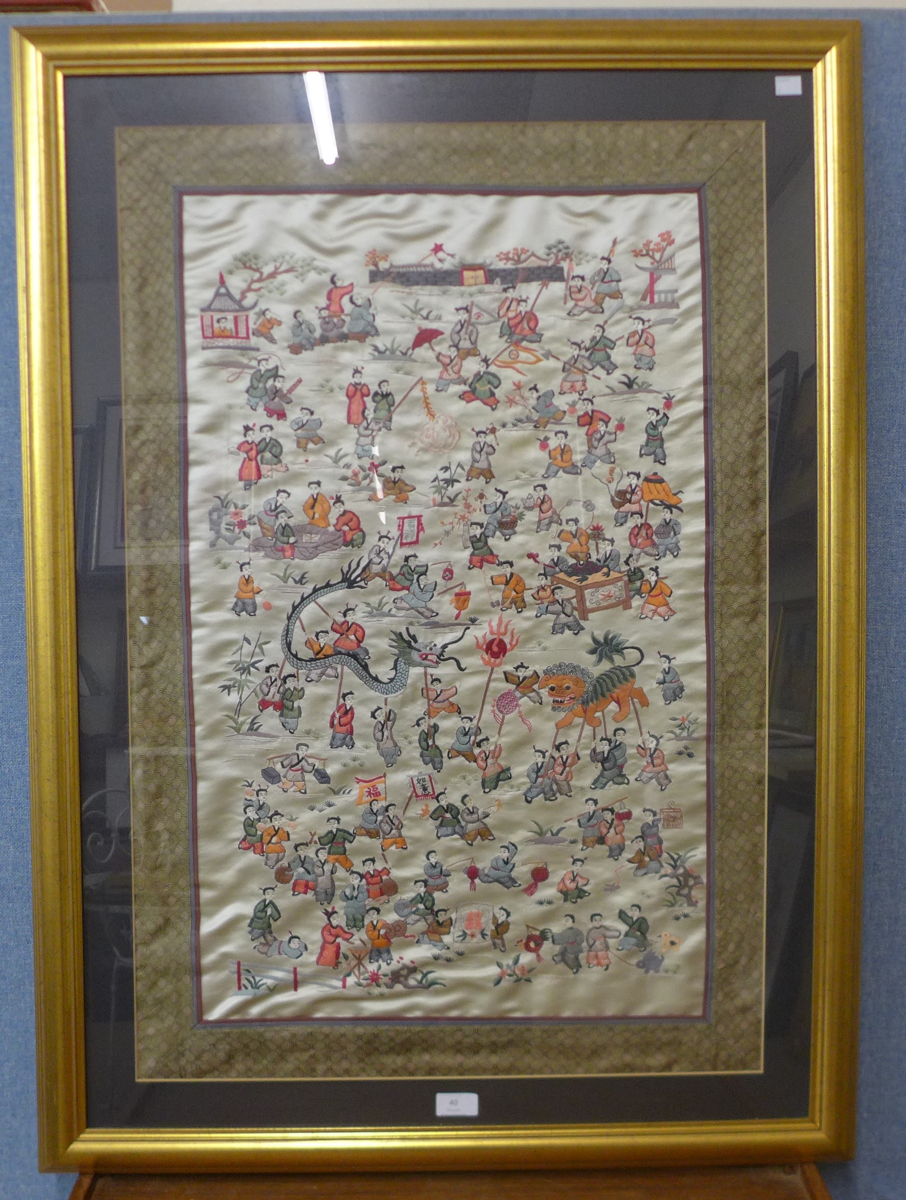 A large Chinese silk embroidery, framed