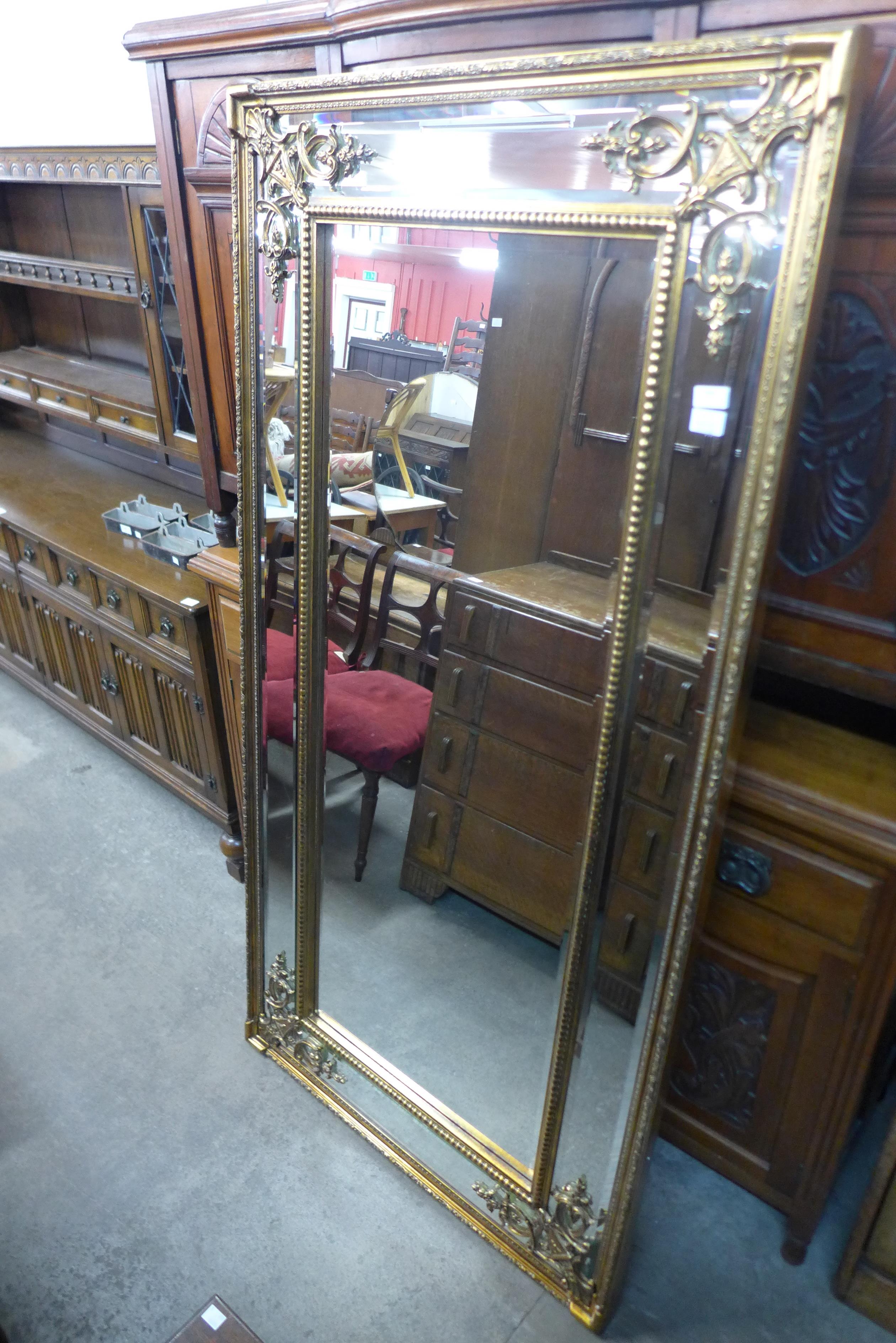 A large French style gilt framed mirror, 183 x 92cms (M33138) #