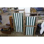 Two folding deck chairs