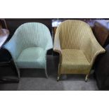 Two painted wicker armchairs