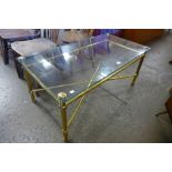 An Italian style brass and glass topped rectangular coffee table