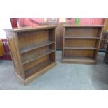 A pair of Edward VII Waring & Gillows oak double sided bookcases, 114cms h, 107cms w, 53cms d