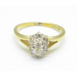 An 18ct gold, diamond cluster ring, 3g, M