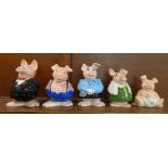 A set of five Wade Nat West pig money banks, (with four original polystyrene boxes and a cardboard