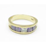 A 9ct gold, purple and white stone ring, 5.6g, R