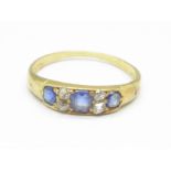 A yellow metal, sapphire and diamond seven stone ring, 2.1g, N