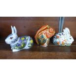 Three Royal Crown Derby paperweights, Squirrel, Meadow Rabbit and Springtime Rabbit, all with gold