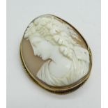 A 9ct gold mounted cameo brooch, mount dented, 36mm wide