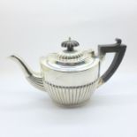 A silver bachelors teapot, finial a/f, hallmarks rubbed, 244g