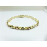 A 9ct gold bracelet, 11.2g