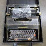 A typewriter with extra keys**PLEASE NOTE THIS LOT IS NOT ELIGIBLE FOR POSTING AND PACKING**