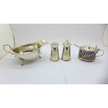 A silver salt and pepper pair, a silver jug and a silver mustard with liner and plated spoon, 272g