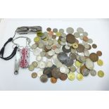 British and foreign coins and three pocket knives
