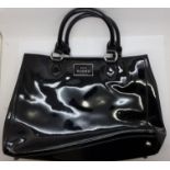 A Lulu Guinness patent leather handbag