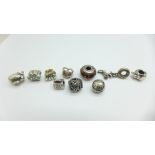 Seven Pandora charms and three others