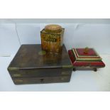 A gentleman's rosewood and brass bound travel box and two tins
