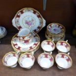 A Royal Albert Lady Hamilton tea set, six setting, with six cups, saucers, tea and side plates, cake