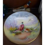 A Beswick pheasant, model 1774 and a hand painted Minton porcelain bowl depicting pheasants,