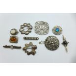 Ten silver brooches