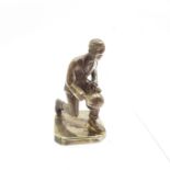 A hallmarked silver figure of a crown green bowler, possibly from a trophy, 78g