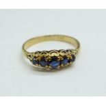 A 9ct gold and five stone sapphire ring, 2g, Q