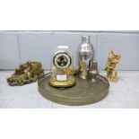 A clock and two sculptures including soapstone and a tray with other metalware**PLEASE NOTE THIS LOT