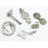 Two silver pendants, two silver brooches a/f and two charms