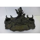 A 19th Century bronze 'countryside' inkwell/brush holder (can be used for quills) width 22.5cm