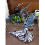 Three glass models of fish, a model penguin, bird and elephant and a glass bird ornament