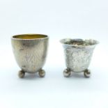 A Danish silver cup marked P. Hertz, 40.6g, and one other embossed 830 silver cup, 37.8g