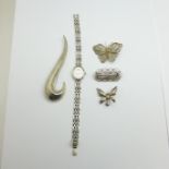 A collection of silver including a silver lady's Rotary wristwatch, two filigree brooches and two