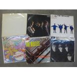 Six The Beatles LPs, including White Album No. 0418661, (top open), Please Please Me and A Hard Days