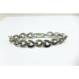 A silver and marcasite bracelet, 27g