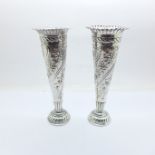 A pair of silver vases by William Comyns, London 1895, 16.5cm, weighted