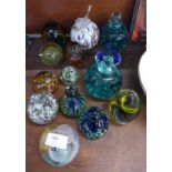 Fifteen glass paperweights including two M'dina