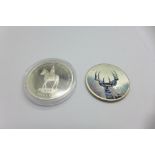 A Republic of Liberia year 2000 10 dollars coin with white tail deer decoration and a Falkland