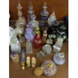 A collection of twenty-six glass scent bottles