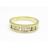 An 18ct gold, five stone diamond ring, 3.6g, O